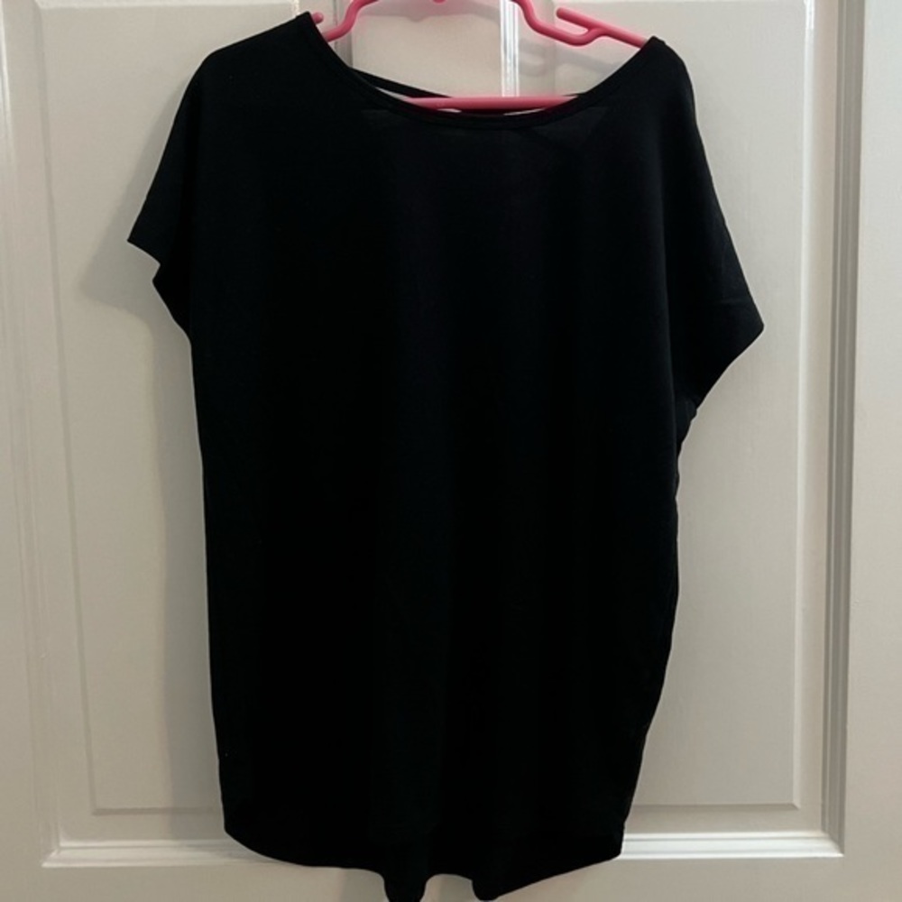 Girls athletic tee shirt. Size large (10/12)